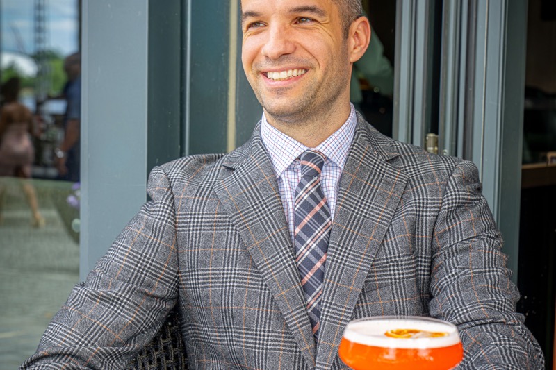 Guest enjoying a cocktail on the Willowsong patio.